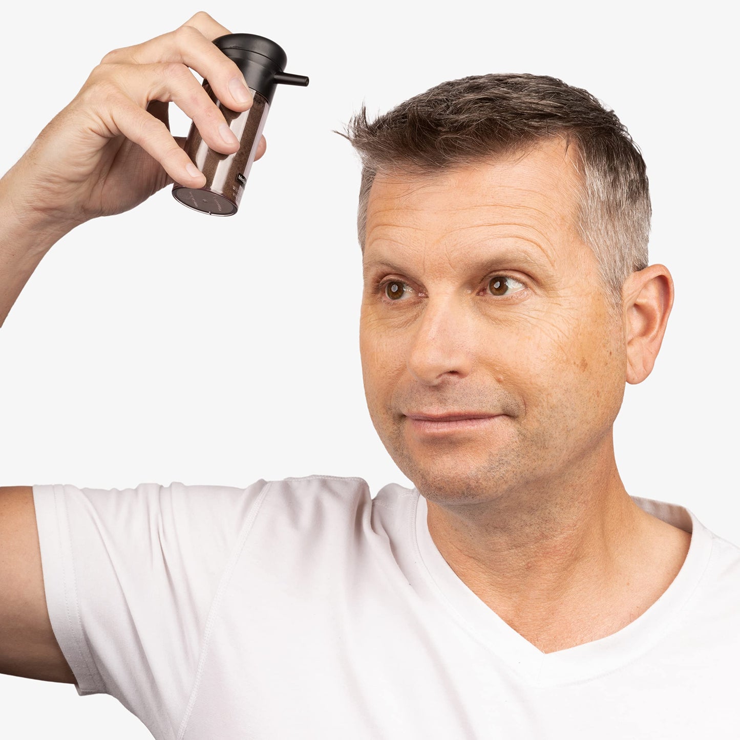 Caboki hair loss concealer box showing built-in atomizer spray pump applicator