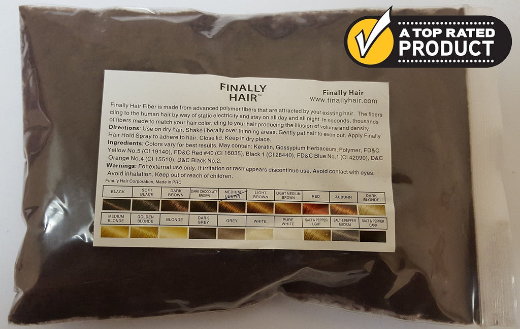 Close up of medium brown hair building fiber texture and color shade