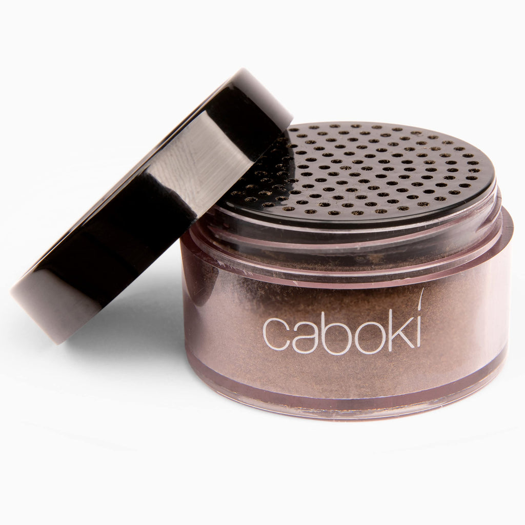 Caboki hair building fiber bottle showing product label details