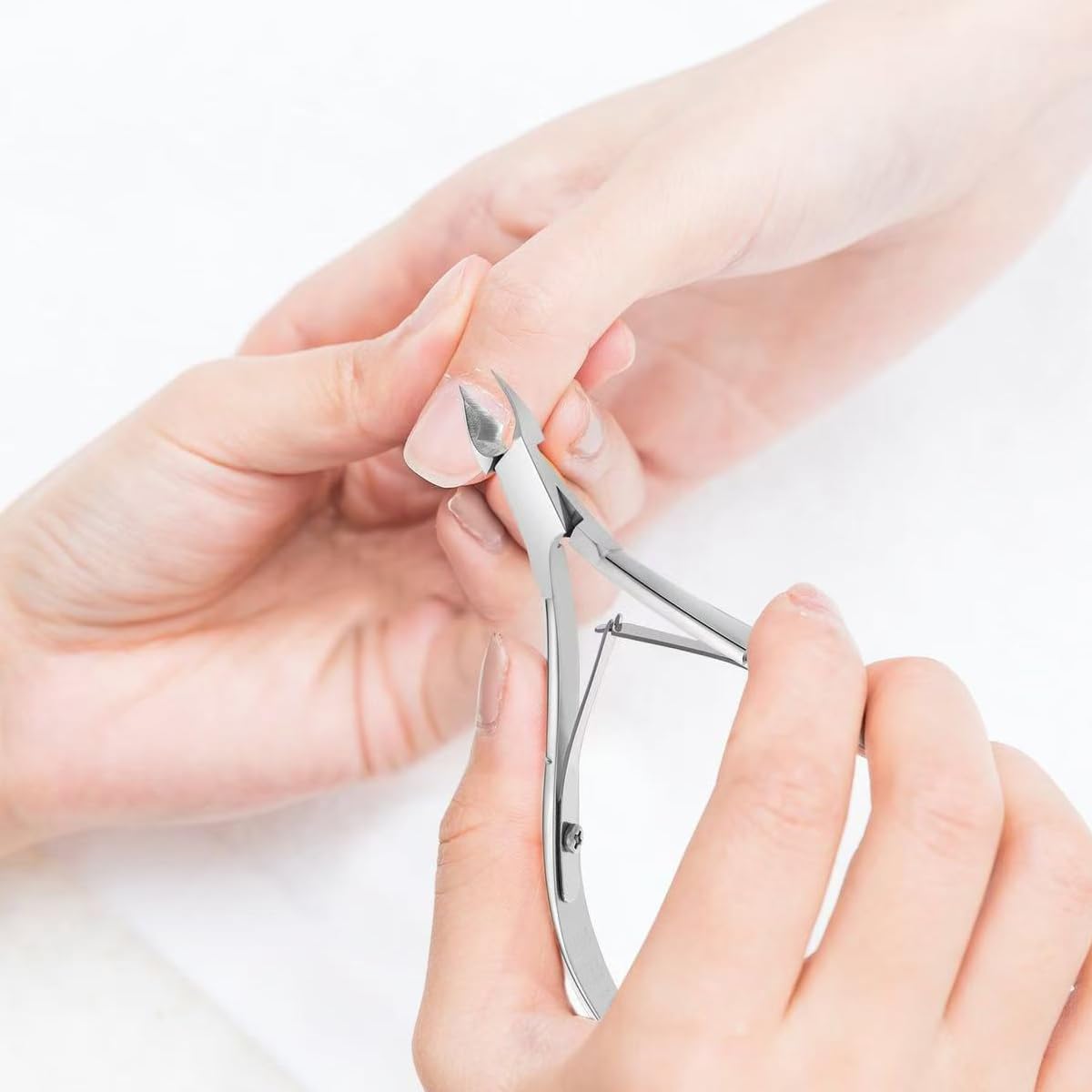 Flauntia imported surgical grade cuticle nippers set being sanitized for hygienic nail grooming.