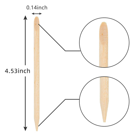 Close up of double-sided wooden cuticle pusher tips