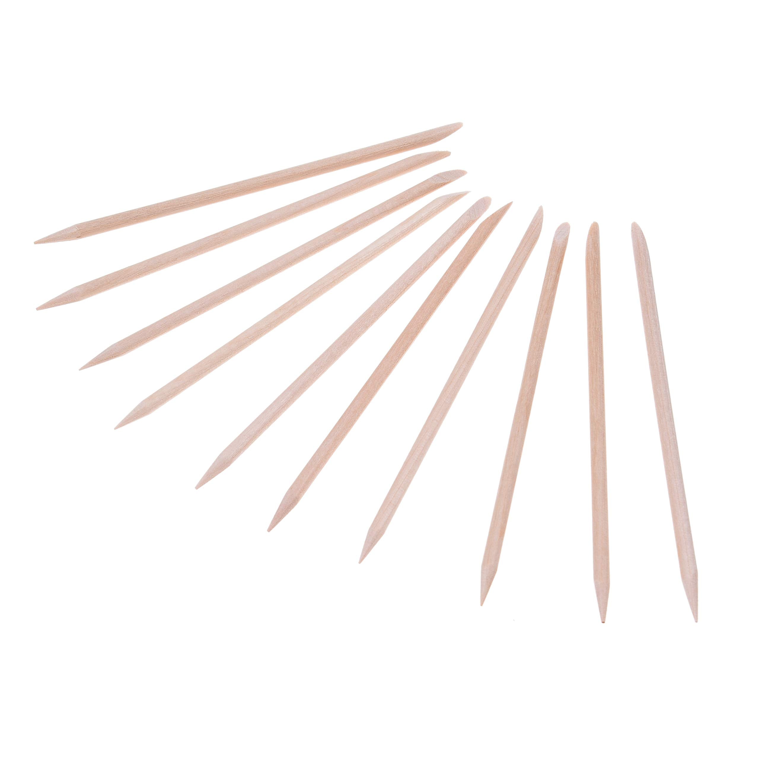 Orange wood nail sticks for manicure and pedicure grooming