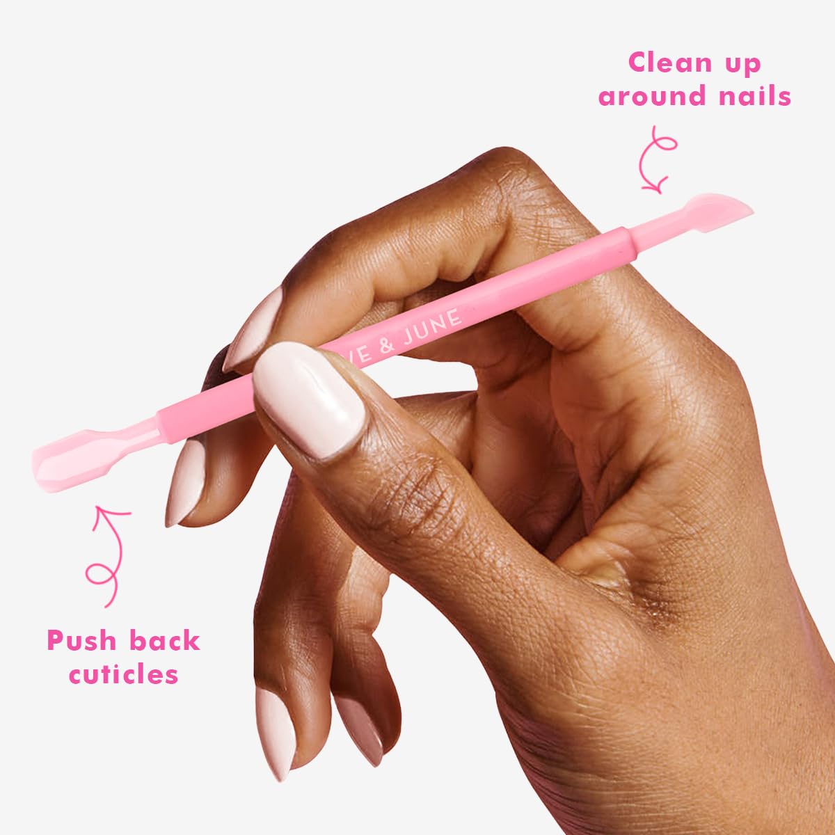 Close up of the rounded plastic pusher end of the Olive And June nail care tool