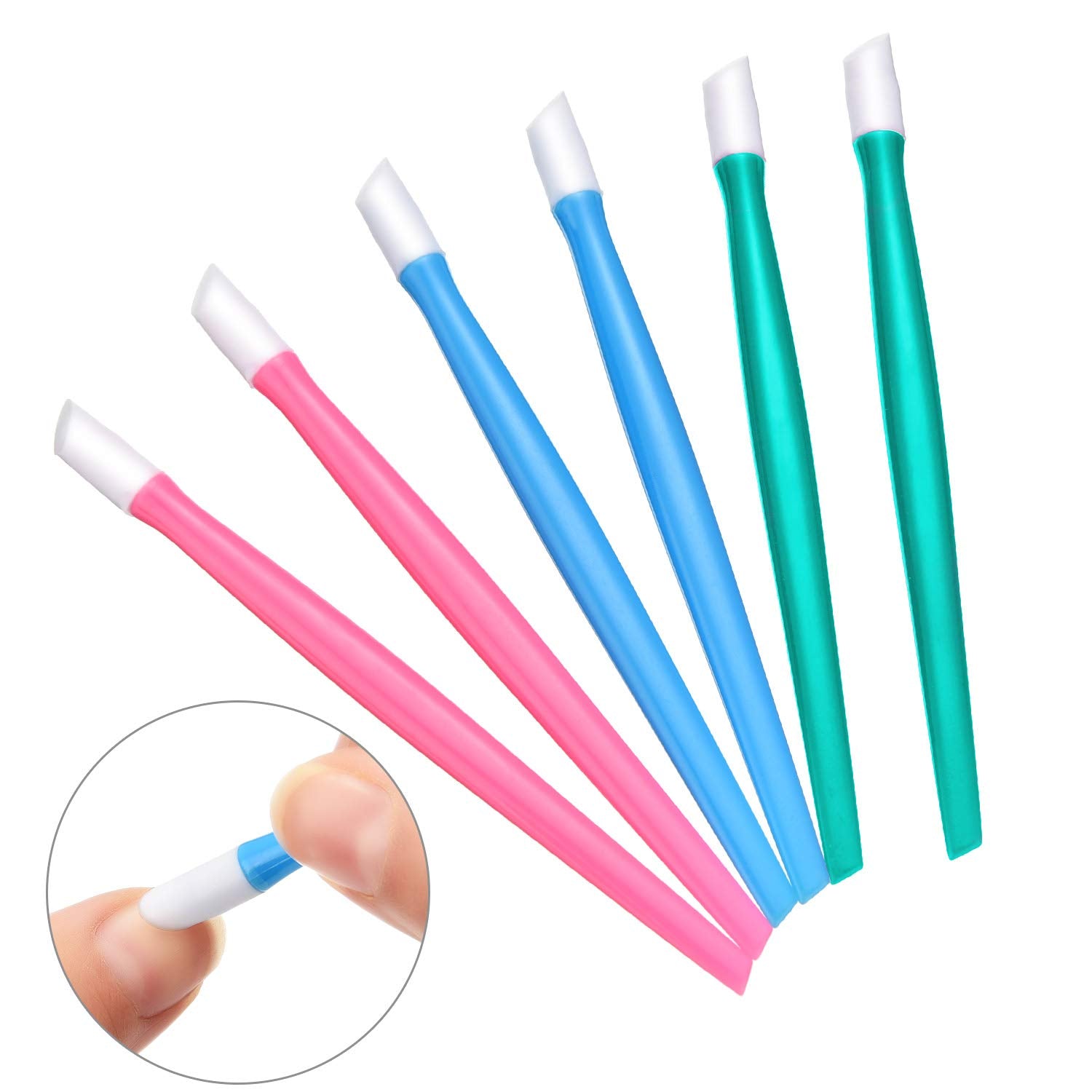 Hand holding BBTO rubber cuticle pusher for nail grooming