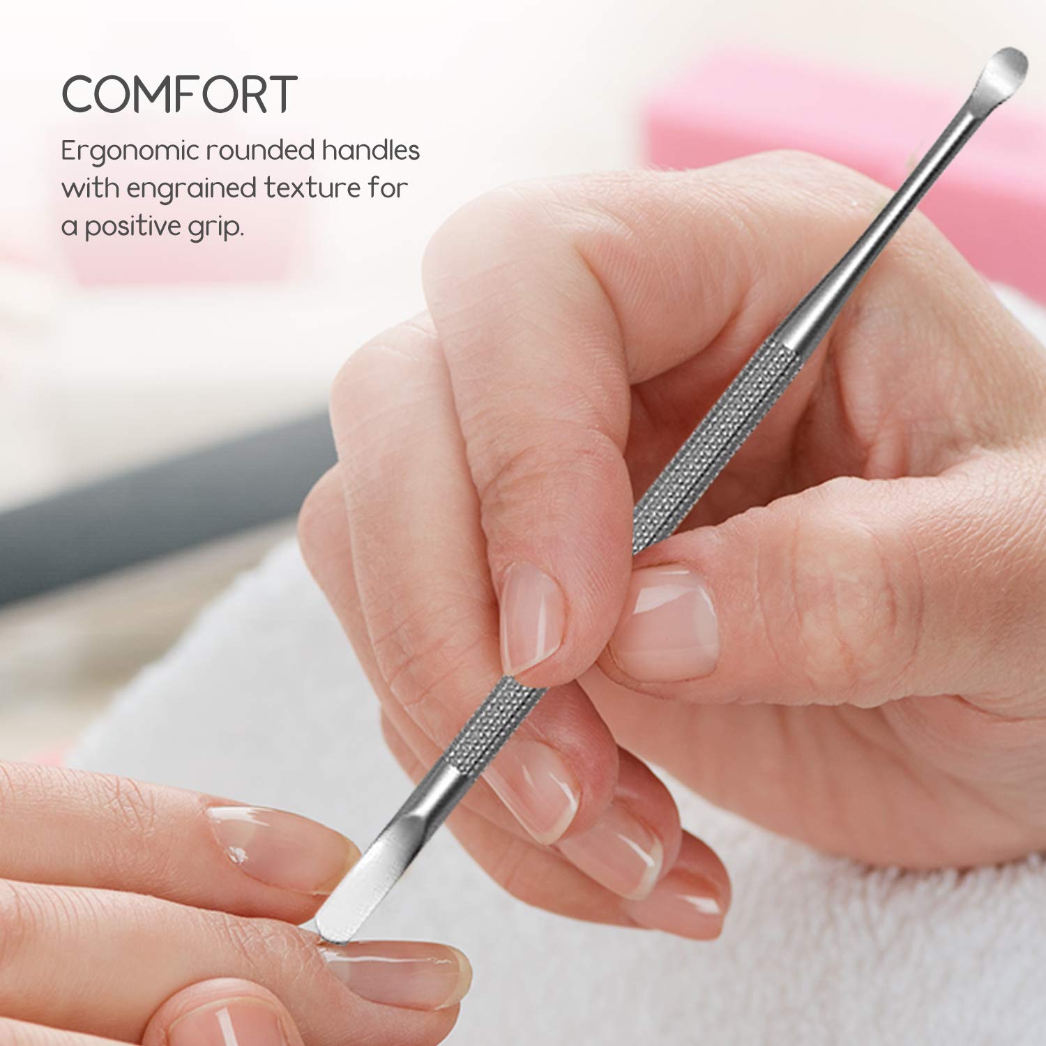Close up of the spoon nail cleaner end of the tool