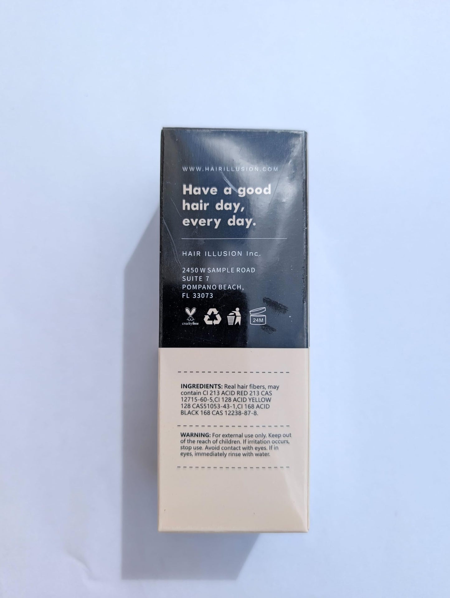 Hair Illusion black variant product packaging highlighting 100 percentage natural texture