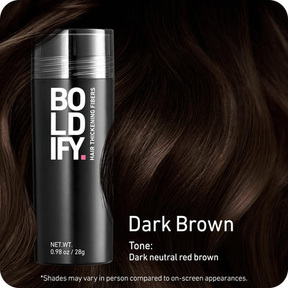 Authentic Boldify hair building powder being applied to a thinning crown for instant volume.