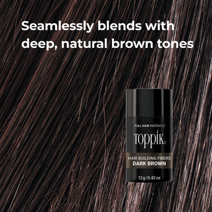 Side profile of a person applying Toppik premium keratin hair powder to their parting line