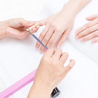 Professional nail technician using Opove stainless steel tools
