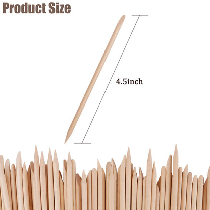 Close up of double ended orange wood nail stick tip