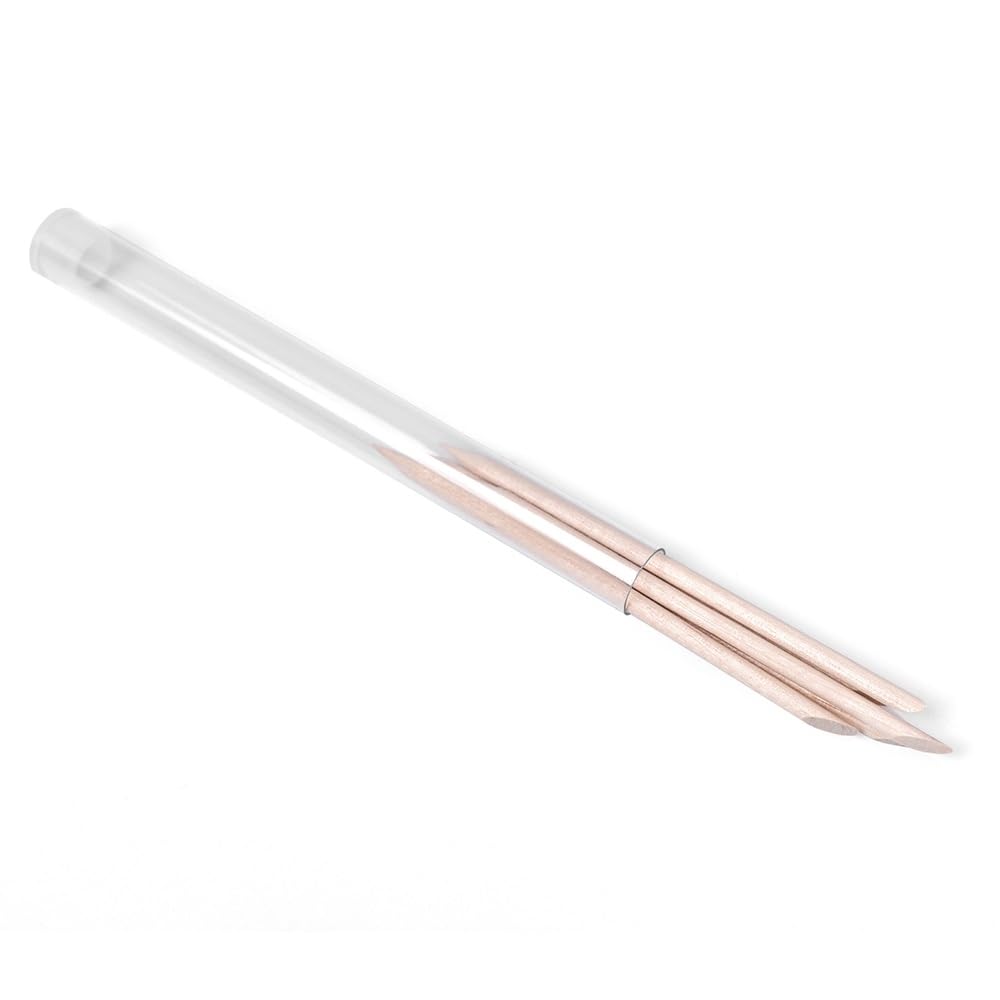 Close up of double-sided orange wood stick tips