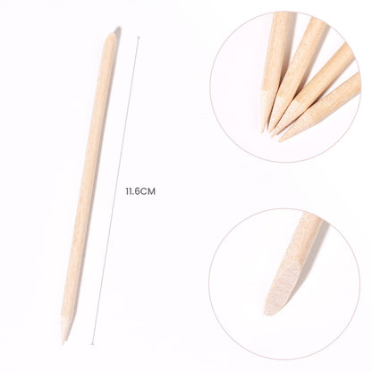 Orange wood cuticle pusher set inside clear protective tube