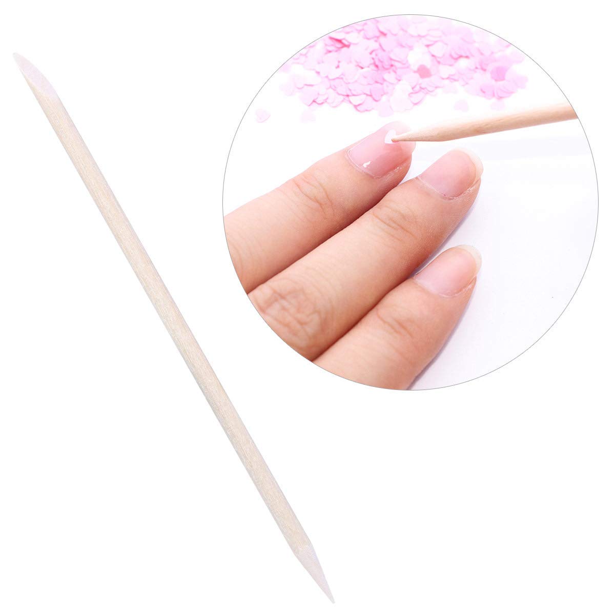 Close up of pointed end orange wood nail tool