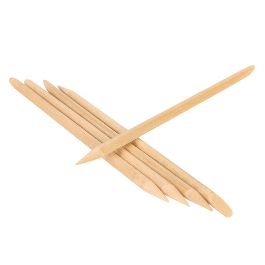 Close up of double ended wooden cuticle pusher tip