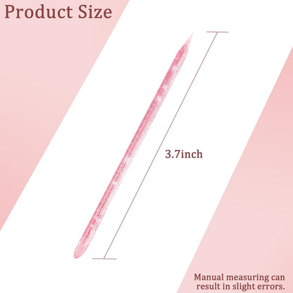 Close up of double sided plastic cuticle pusher tool