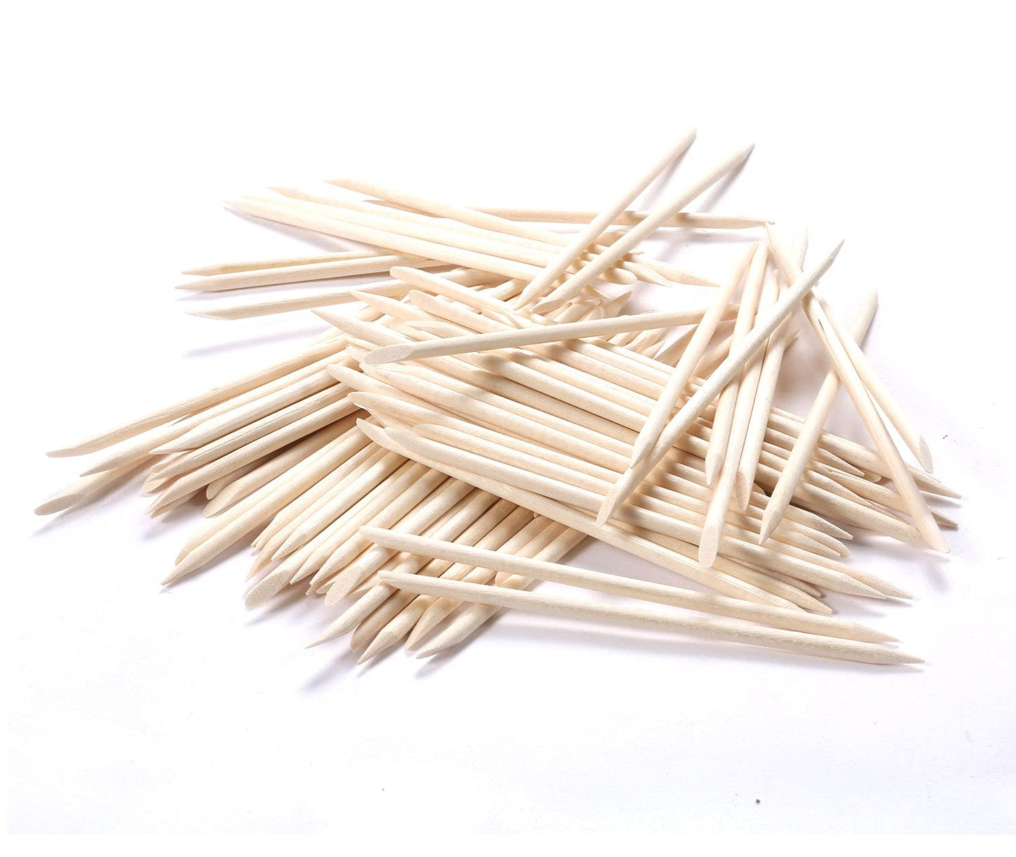 Using flat end of orange wood stick on nail cuticle
