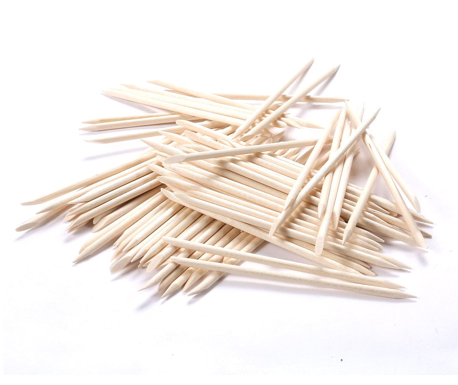 Using flat end of orange wood stick on nail cuticle