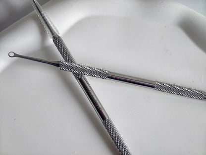 Detailed view of beveled end for nail surface preparation