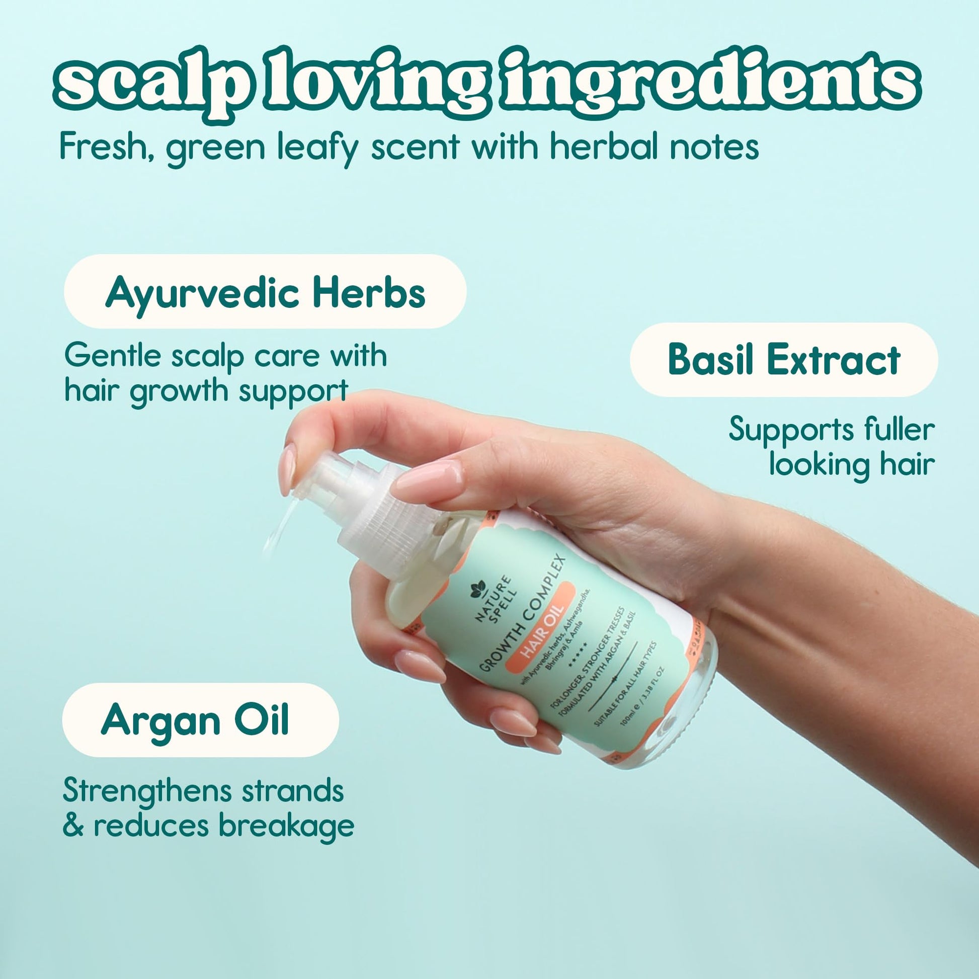 Person applying Nature Spell oil to hair ends