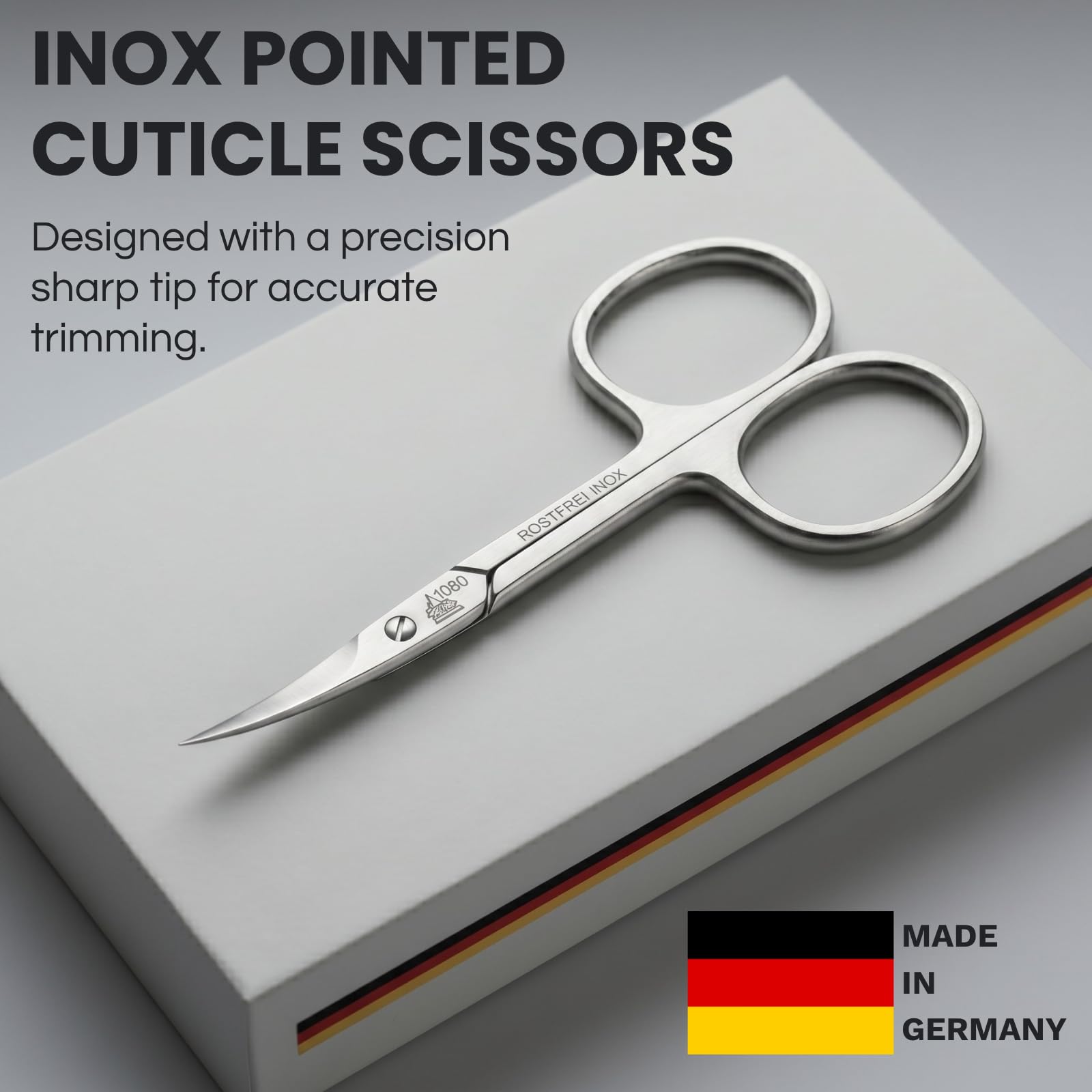 Erbe German cuticle remover showcasing the sharp curved blades and matte finish stainless steel construction