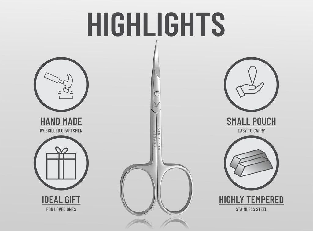 Vesara curved manicure scissors being held to demonstrate the lightweight ring handles
