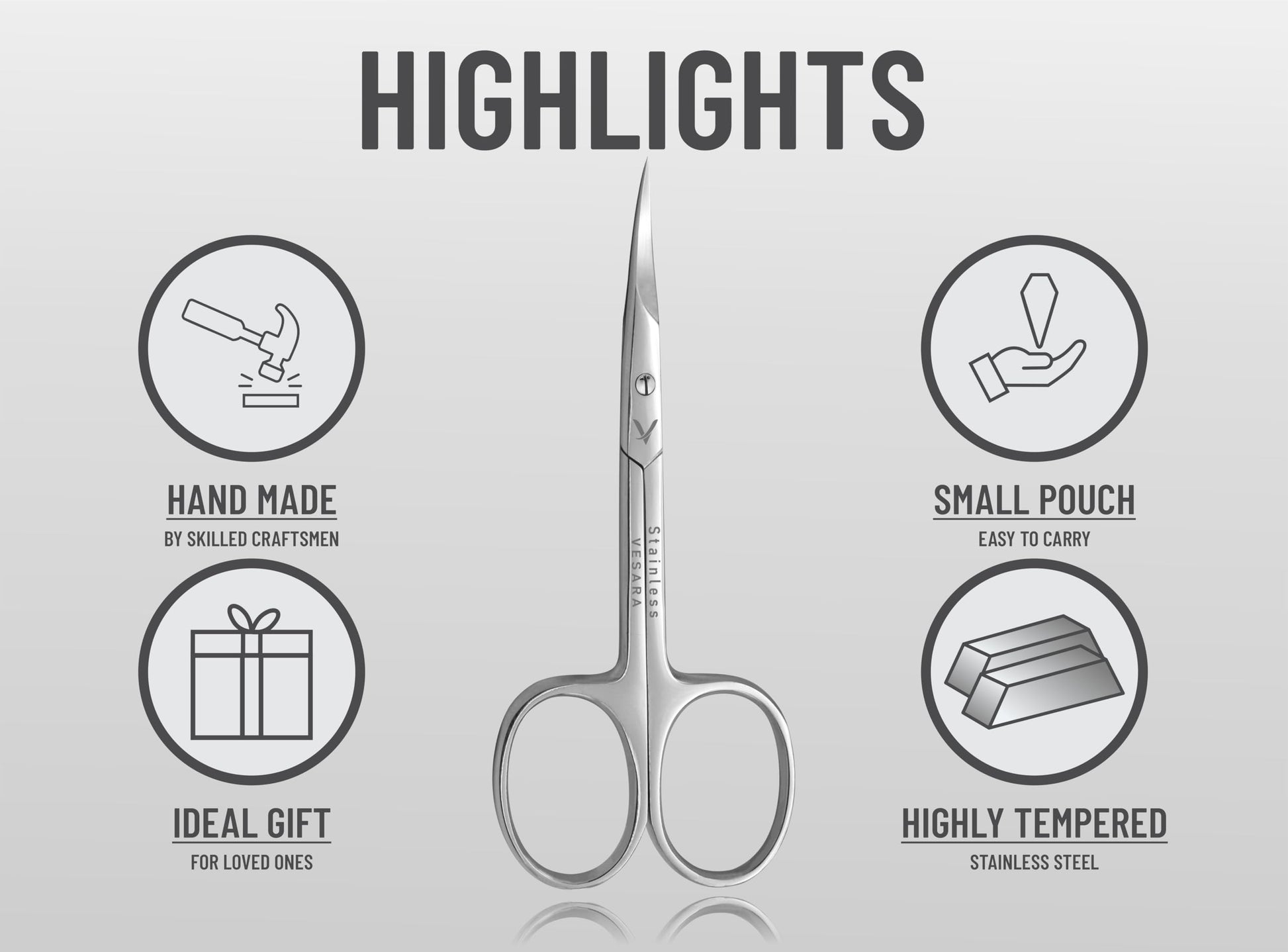 Vesara curved manicure scissors being held to demonstrate the lightweight ring handles