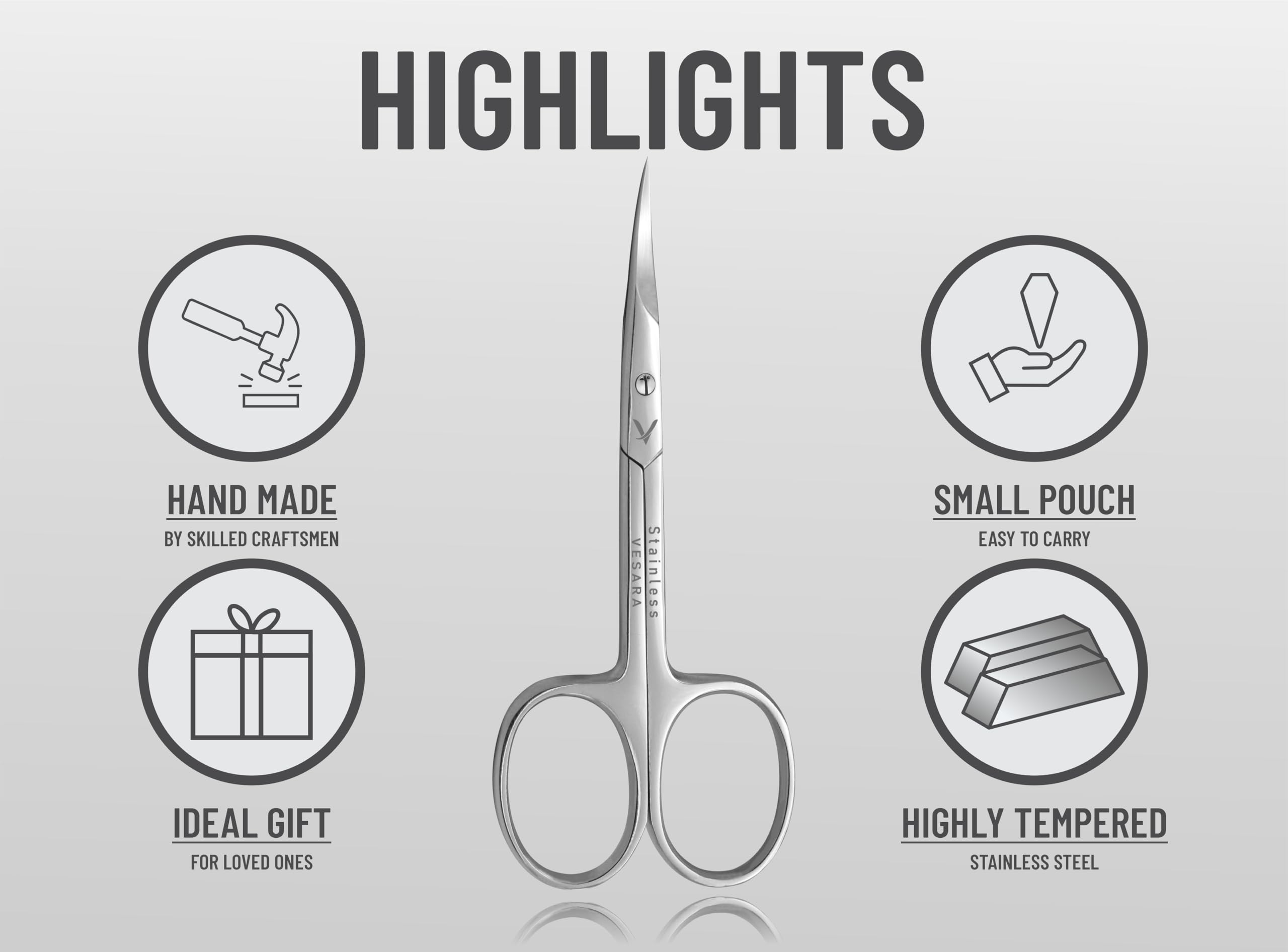 Vesara curved manicure scissors being held to demonstrate the lightweight ring handles