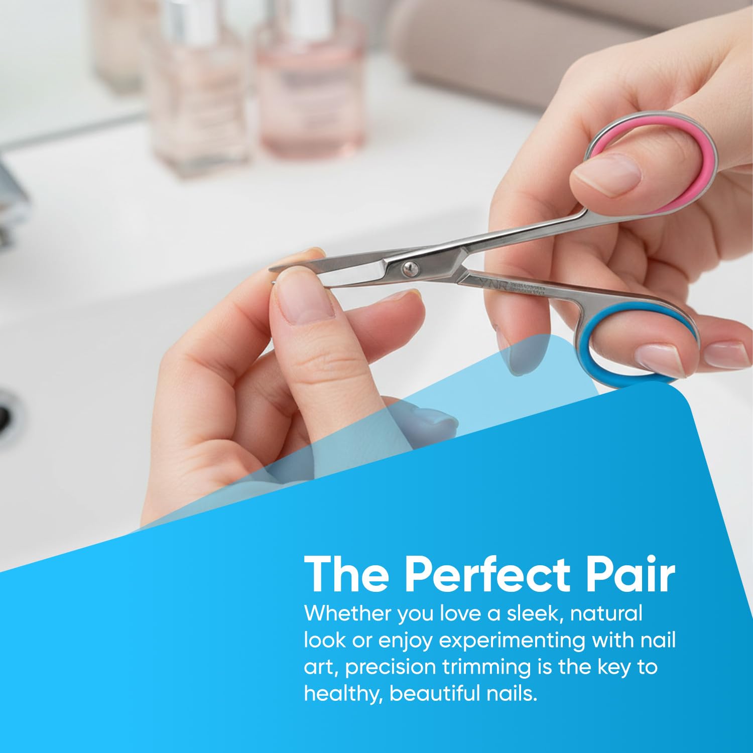 YNR precision curved grooming scissors being used for detailed cuticle care.