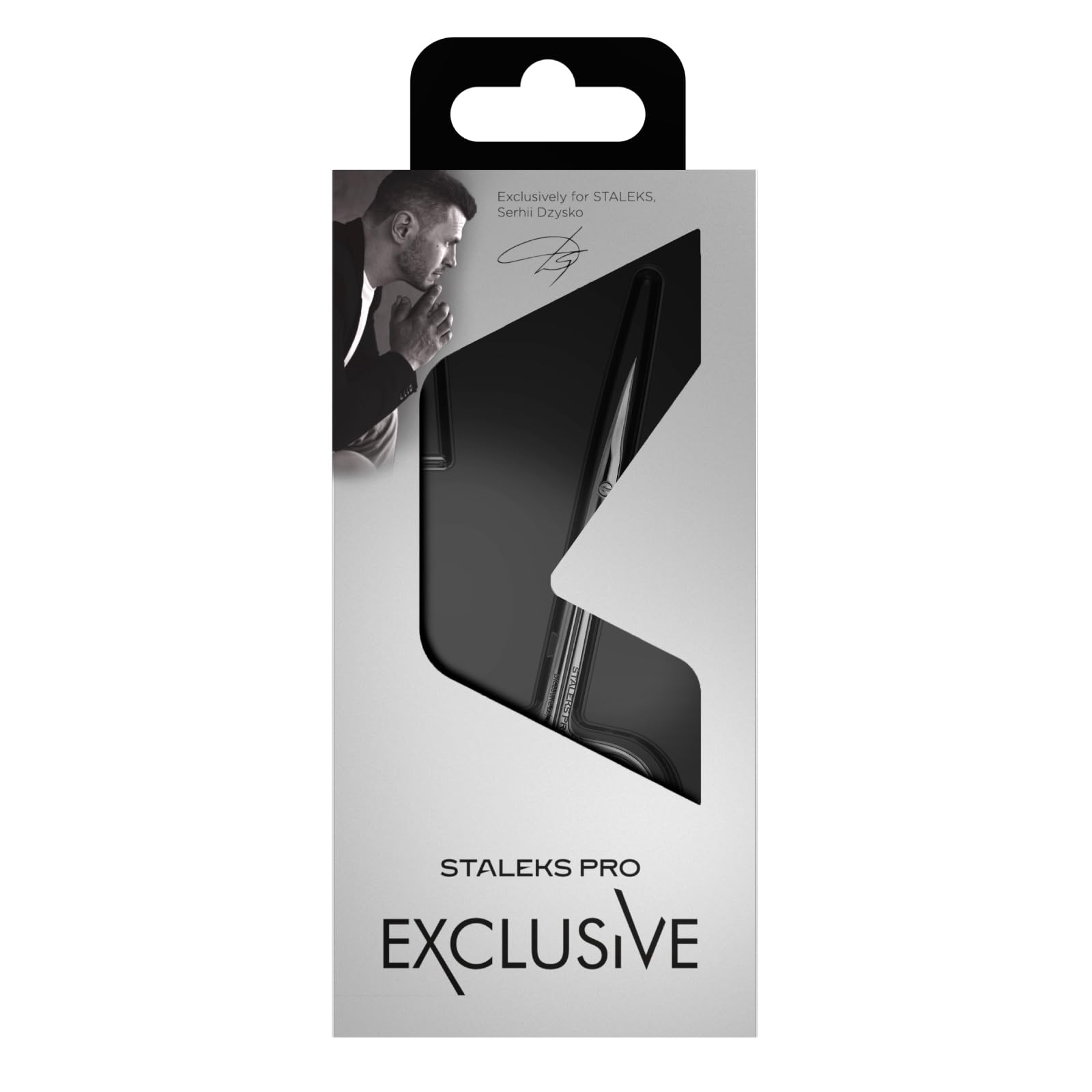 Staleks professional cuticle scissors angled view highlighting the elegant engraved magnolia pattern on the handle.