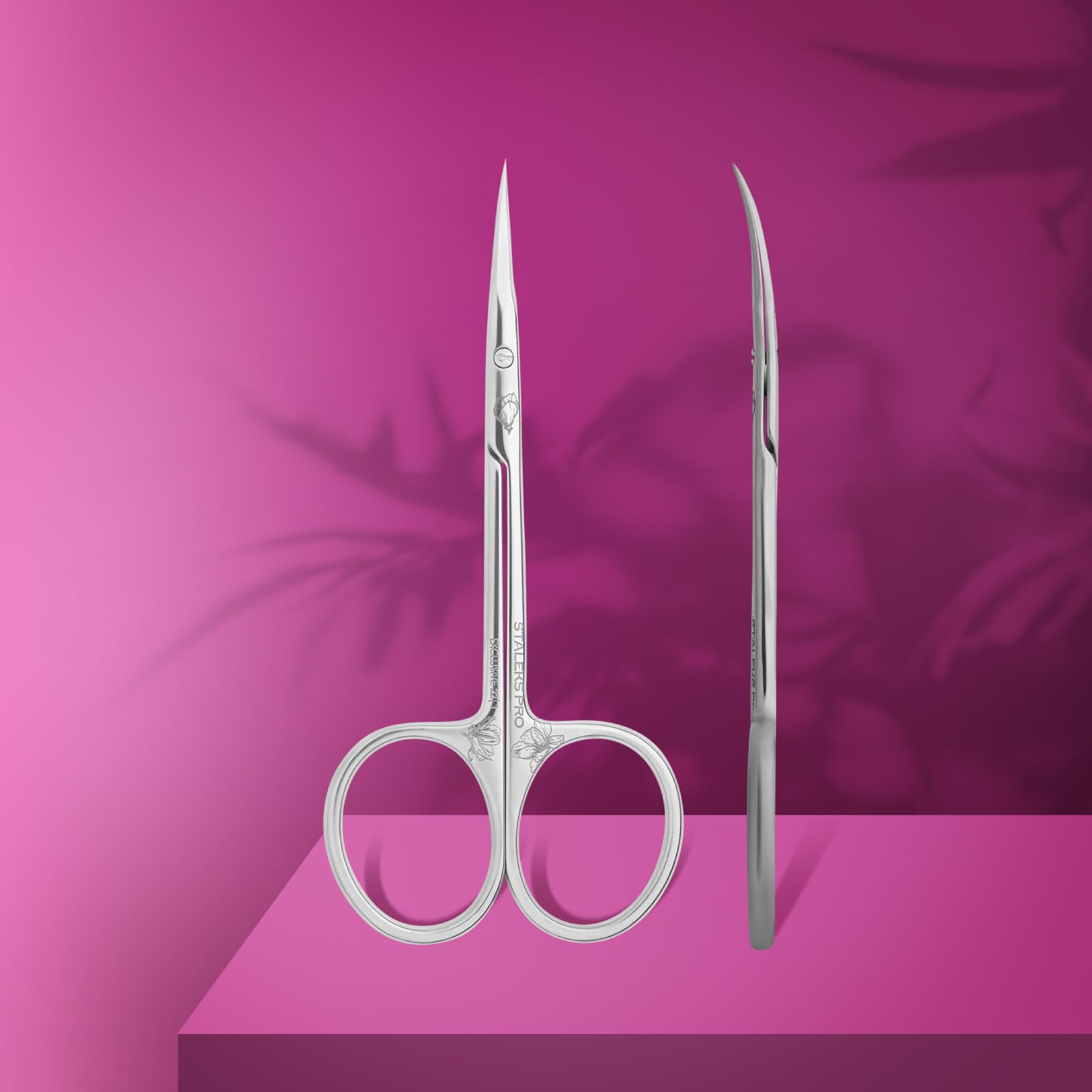 Side view of Staleks Exclusive 22 Type 1 showing the classic blade curvature and polished back surface.