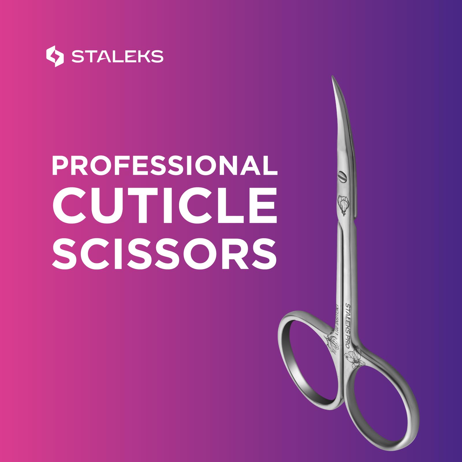 Staleks Magnolia cuticle scissors placed flat to demonstrate the straight medium handle design and ergonomics.