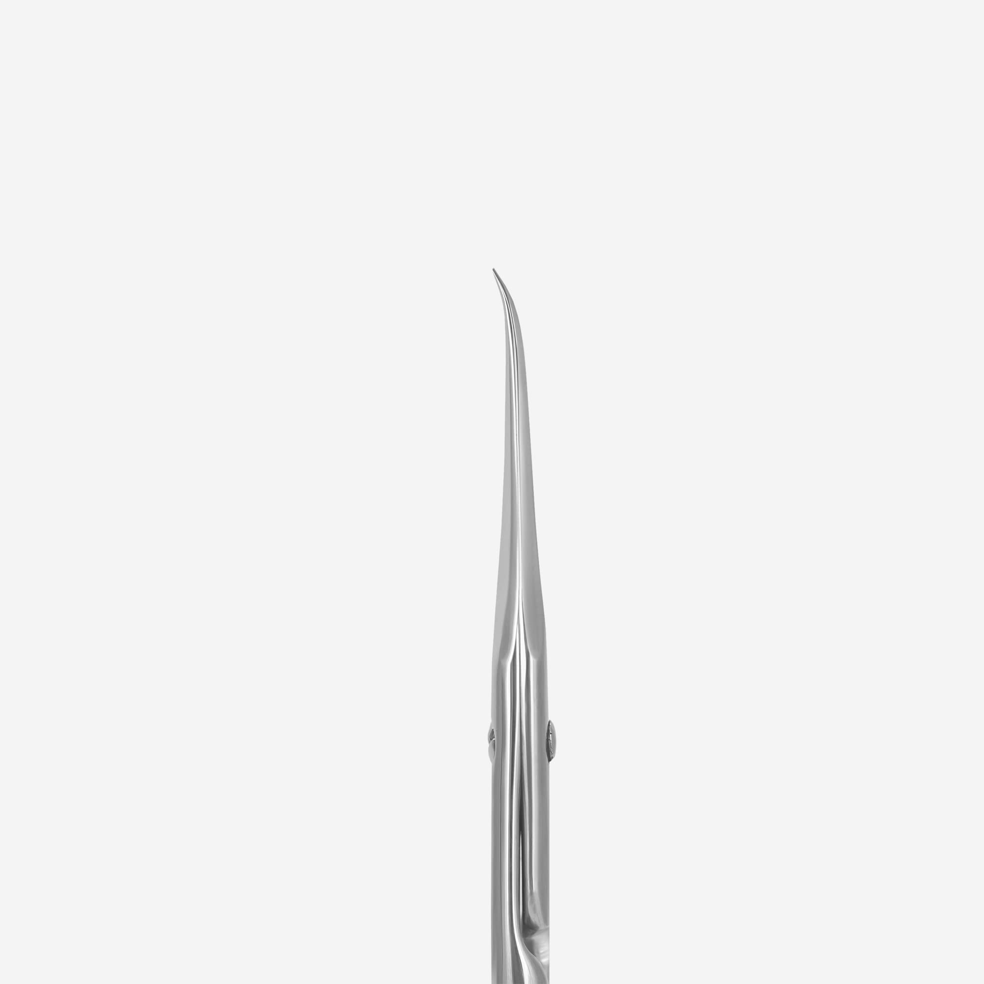 Close-up view of the laser-engraved Magnolia flower pattern on the short straight handles of the Staleks cuticle scissors.
