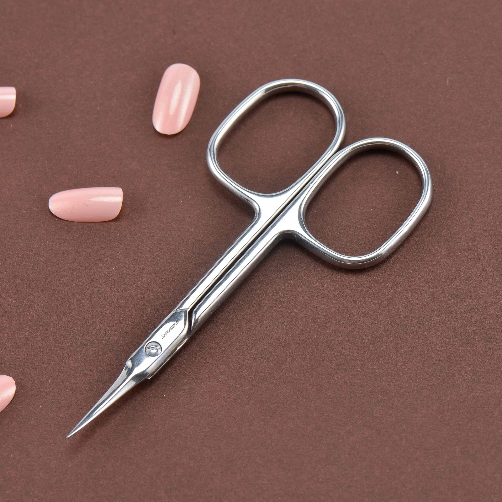 Complete packaging view of the imported JARVISTAR stainless steel manicure tool.