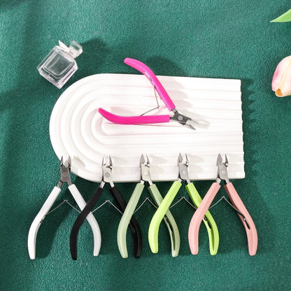 Authentic imported personal nail care trimmer packaging detailing the carbon steel construction.