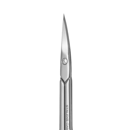 Staleks Classic series small size cuticle scissors next to protective zipper packaging