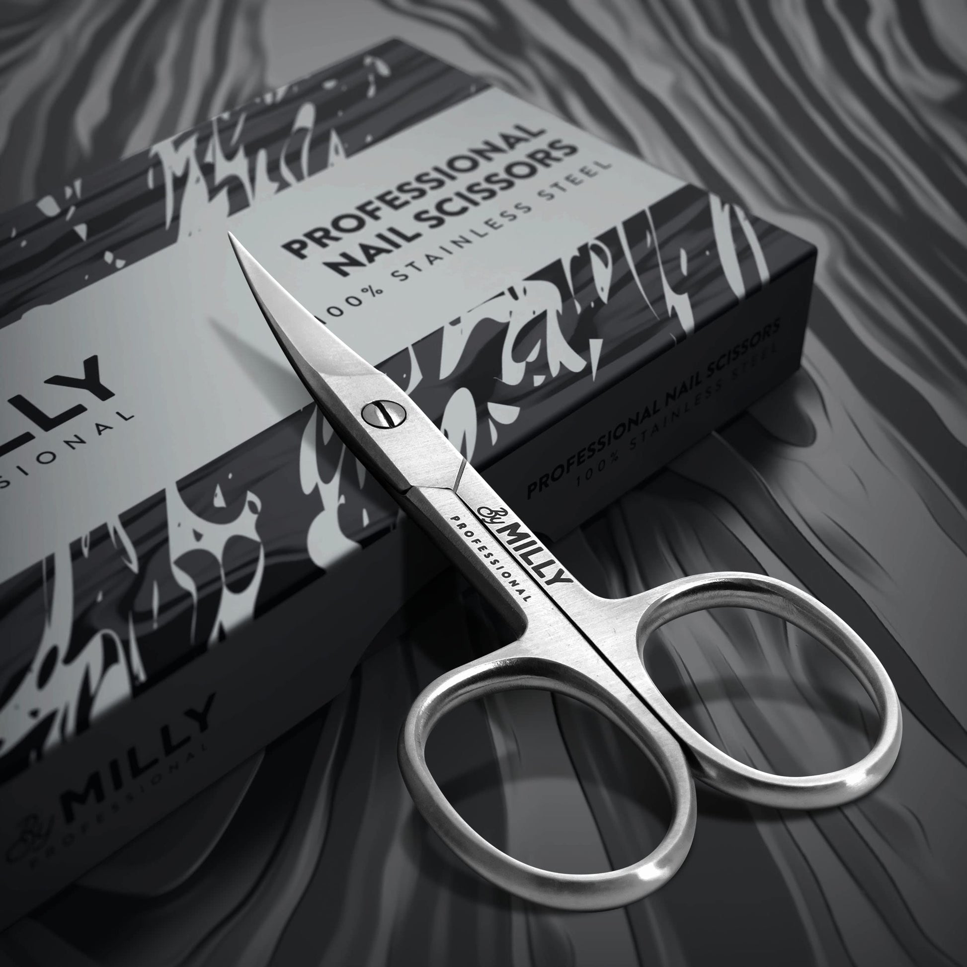 By MILLY curved blade manicure scissors displaying the hand-sharpened razor edge tips.