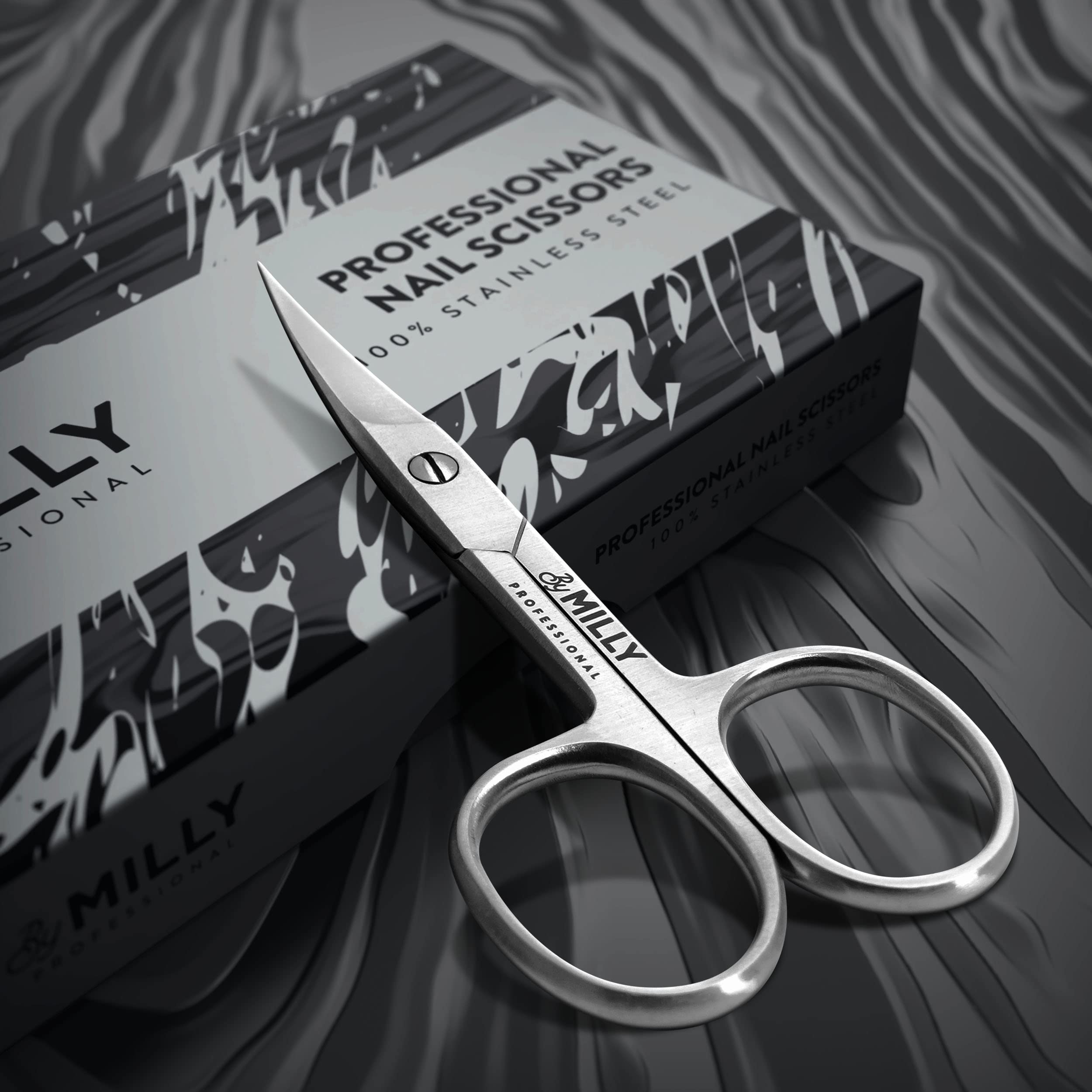 By MILLY curved blade manicure scissors displaying the hand-sharpened razor edge tips.