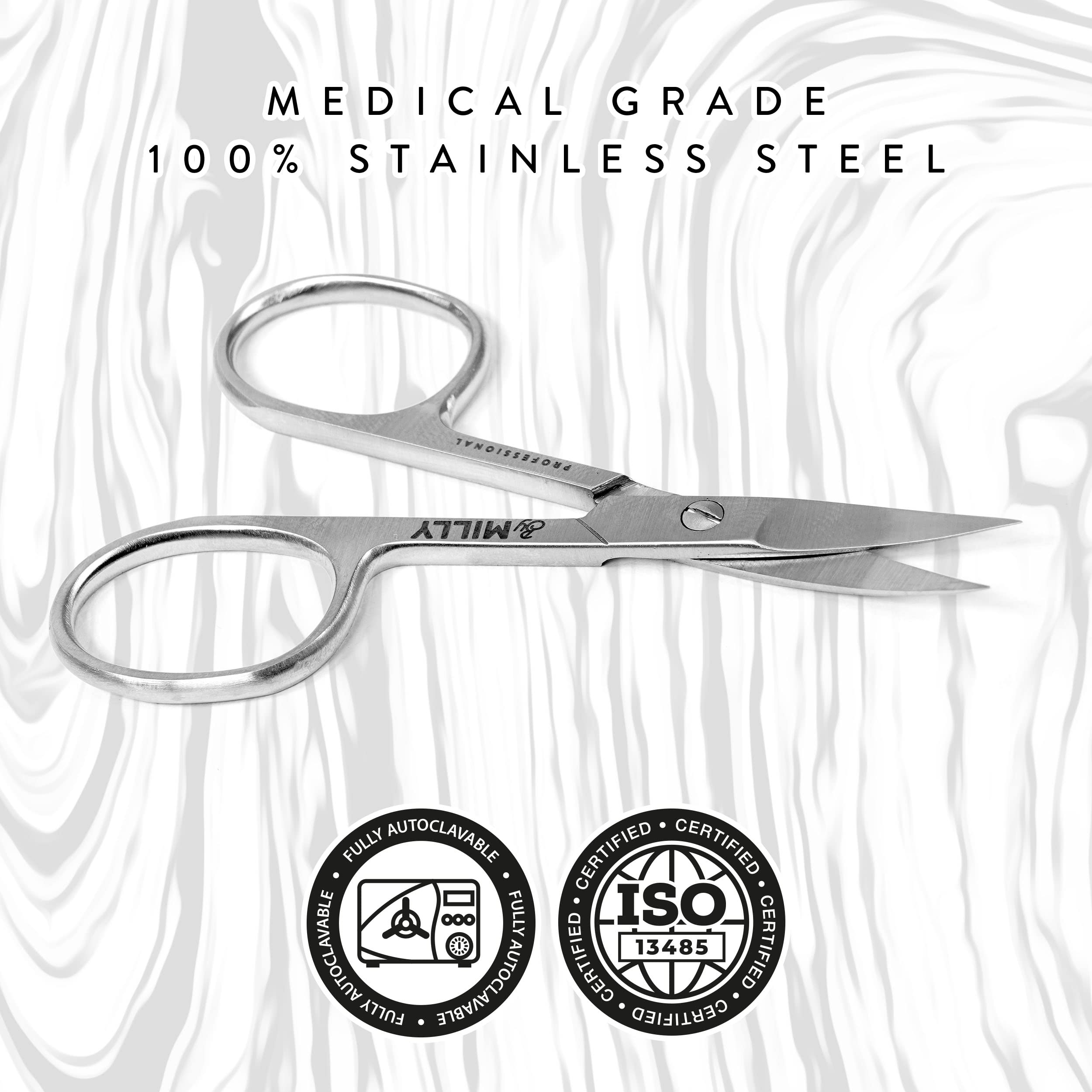 By MILLY professional three point five inch beauty scissors held to demonstrate ergonomic grip.