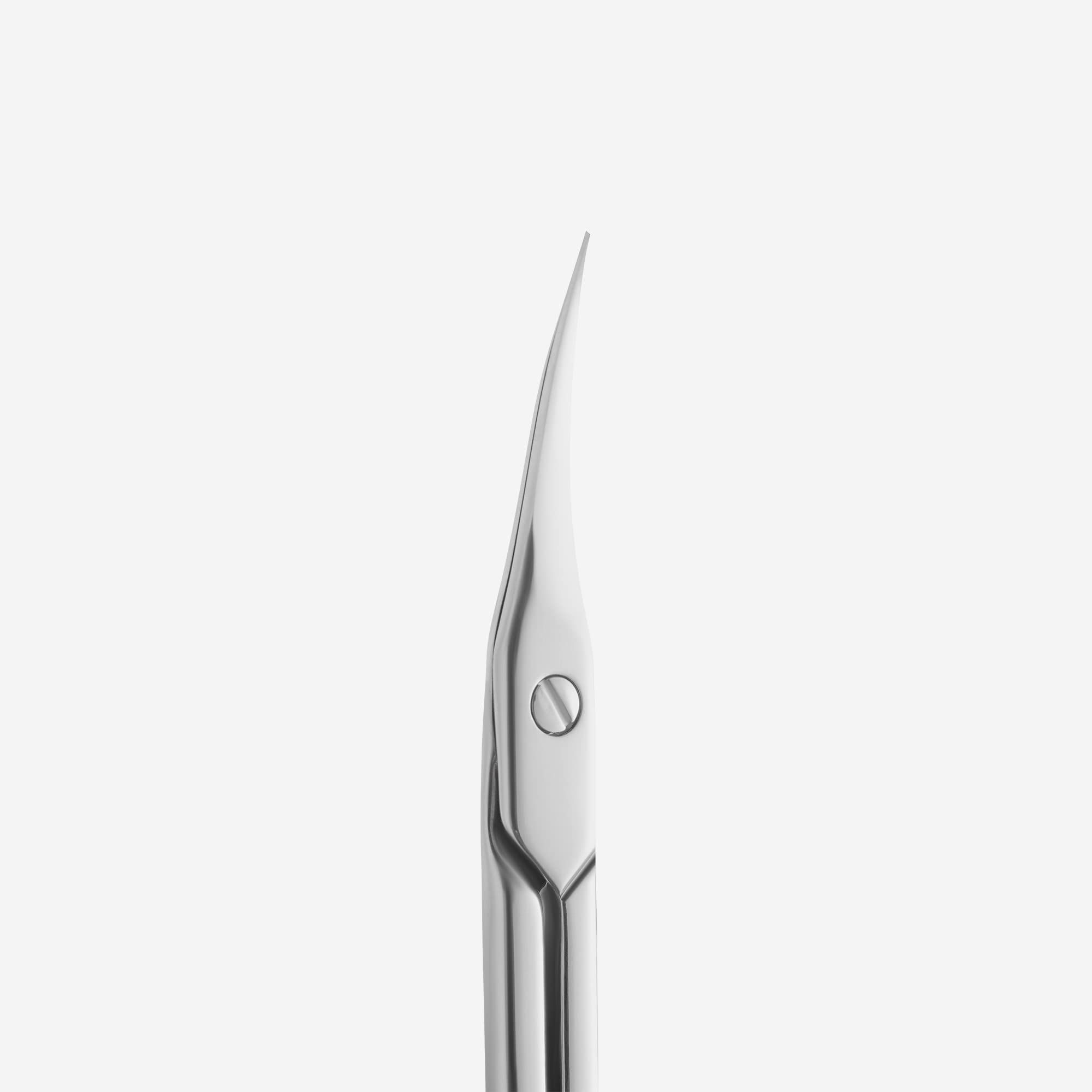Stainless steel Staleks Pro Expert cuticle trimming tool displayed on a sterile surface