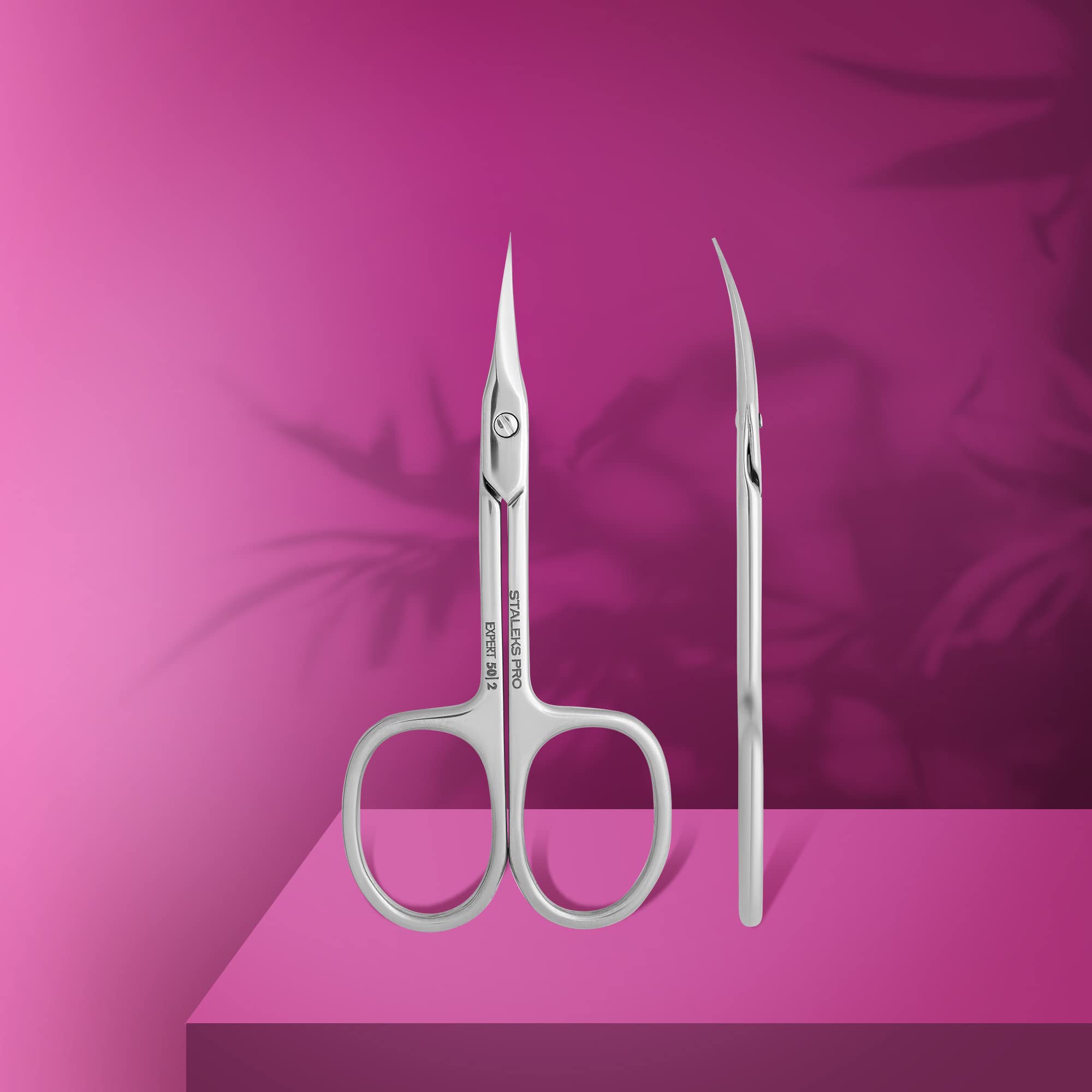 Staleks Pro professional cuticle scissors illustrating the polished back face protection design