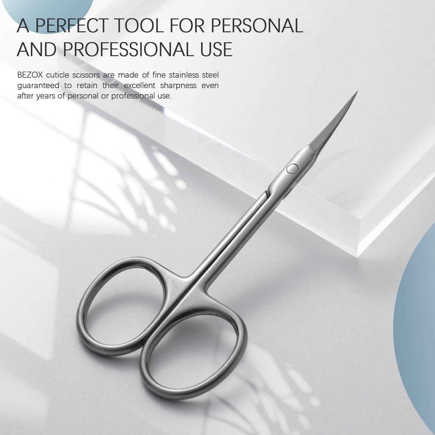 Close up view of the sharp curved tips of the professional BEZOX manicure small scissors.