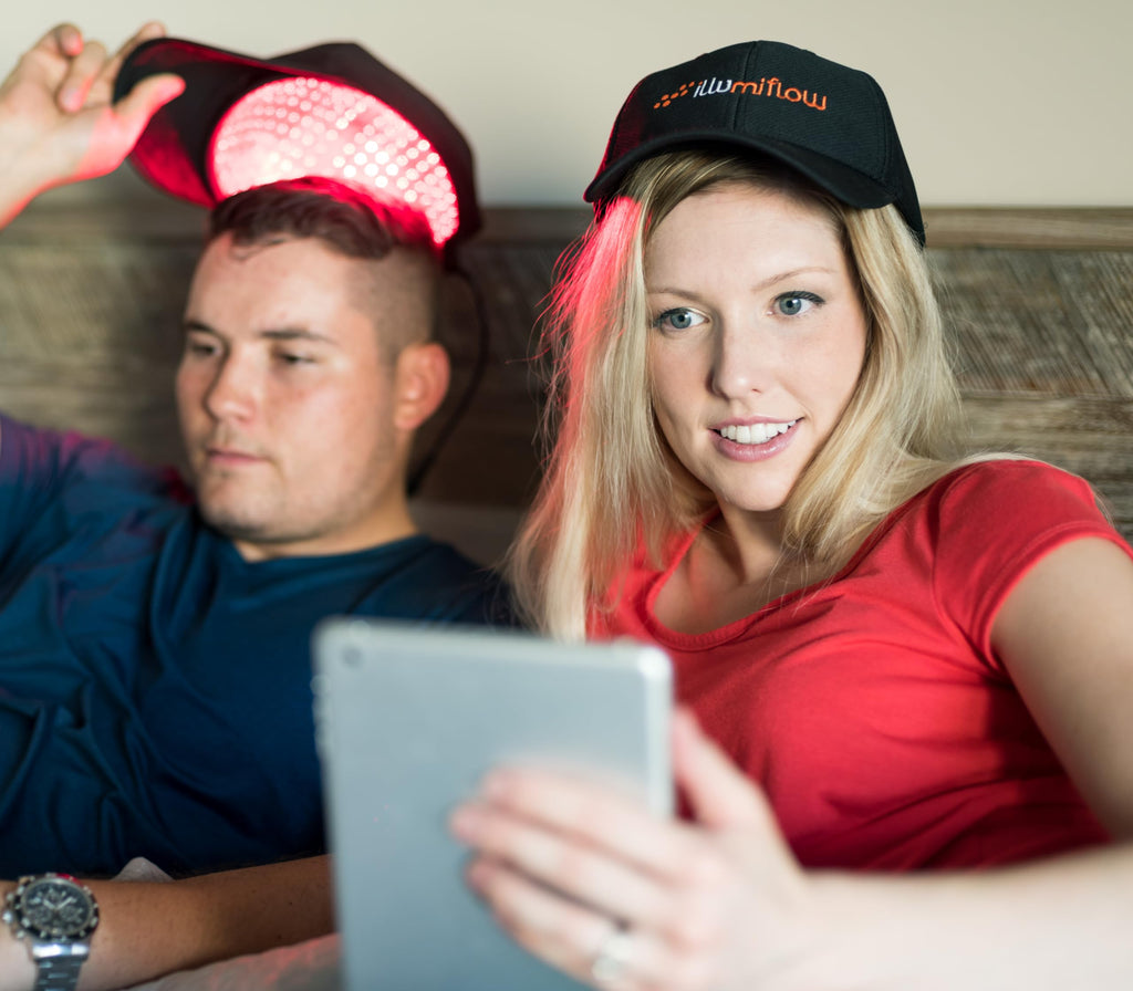 Person wearing illumiflow 272 laser cap for discreet home use treatment.