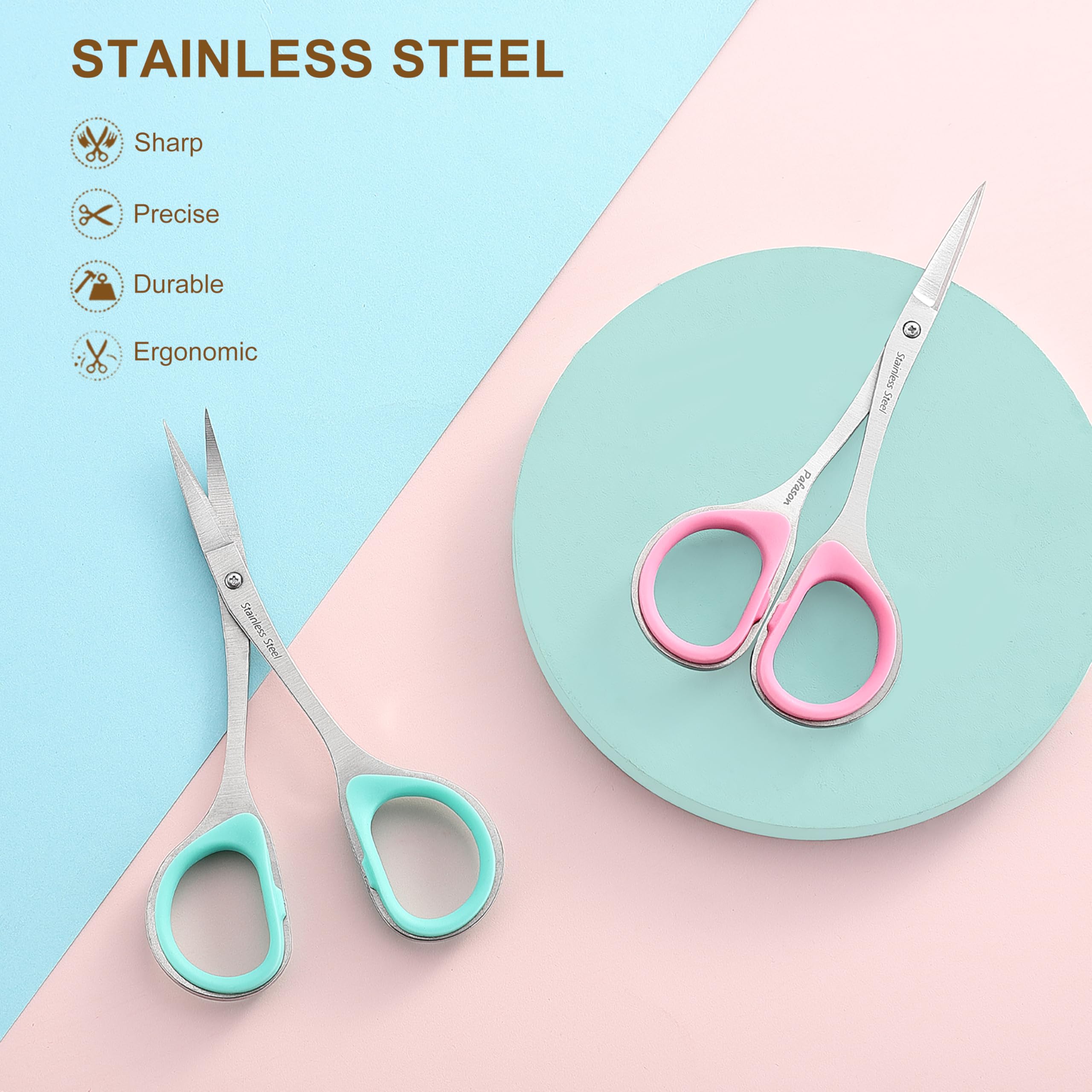 Ergonomic rubber ring handles on the stainless steel cuticle scissors demonstrating comfortable finger grip.