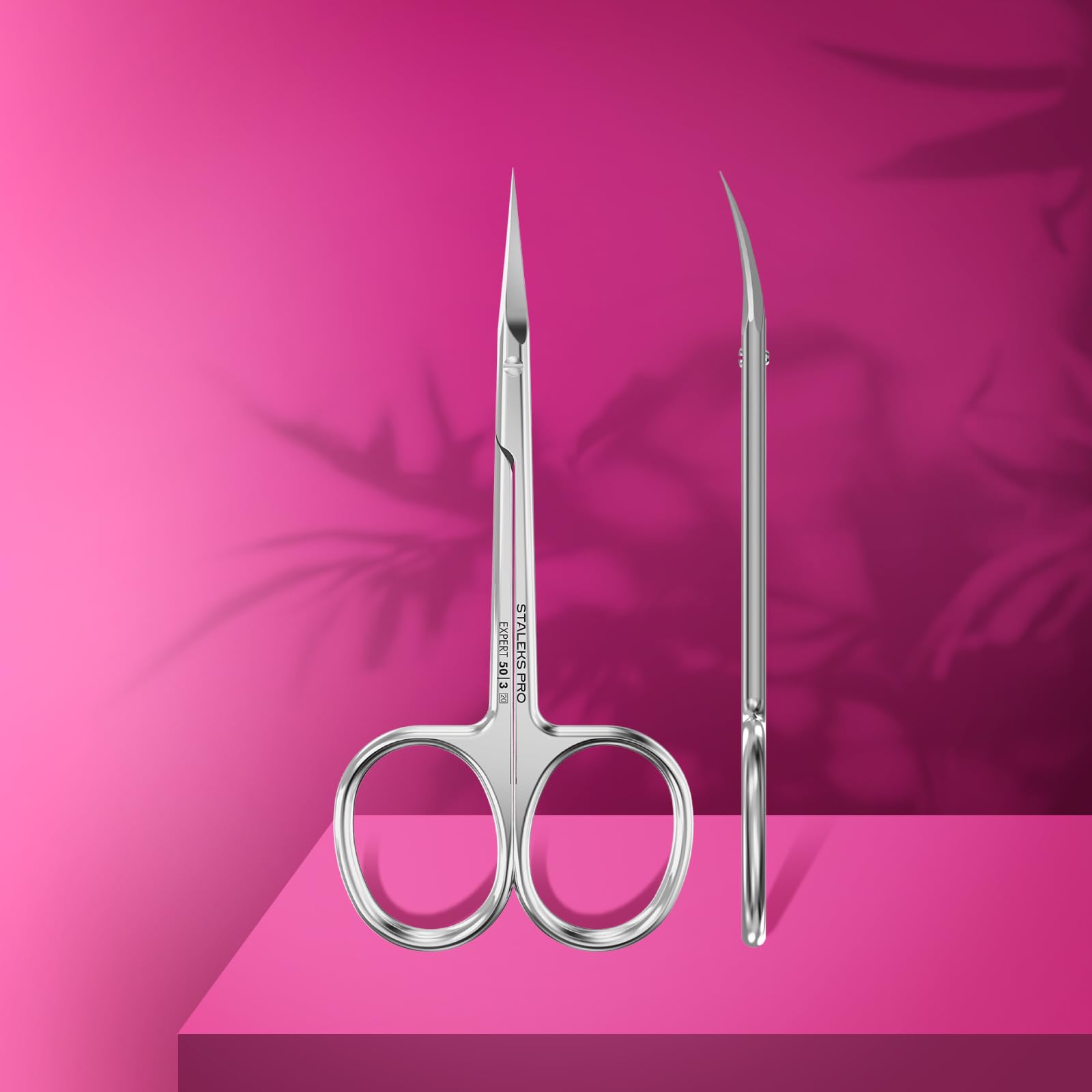Ergonomic straight handles and robust bolt connection of STALEKS stainless steel cuticle scissors.