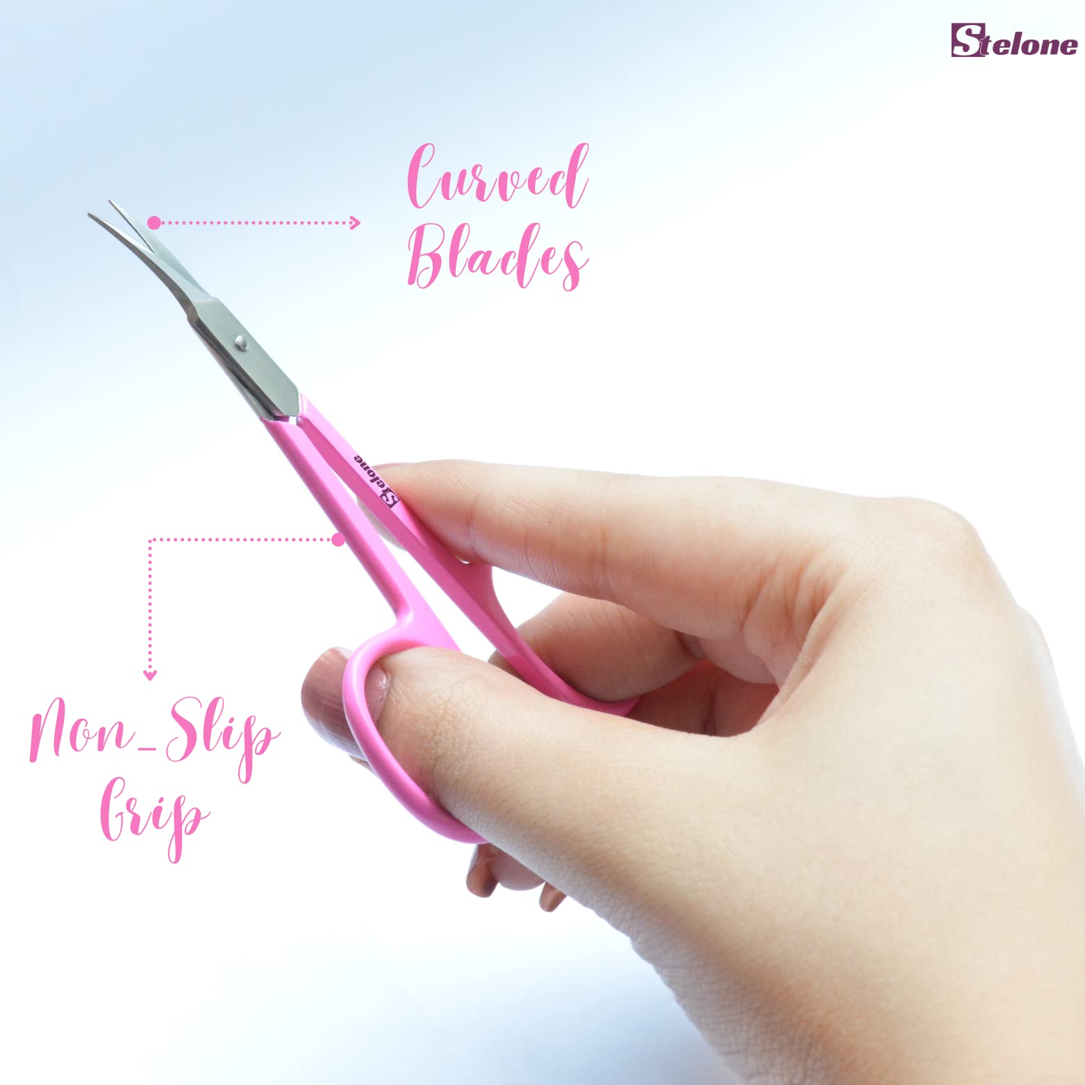 Stelone precision manicure shears highlighting ergonomic finger loops and polished silver finish
