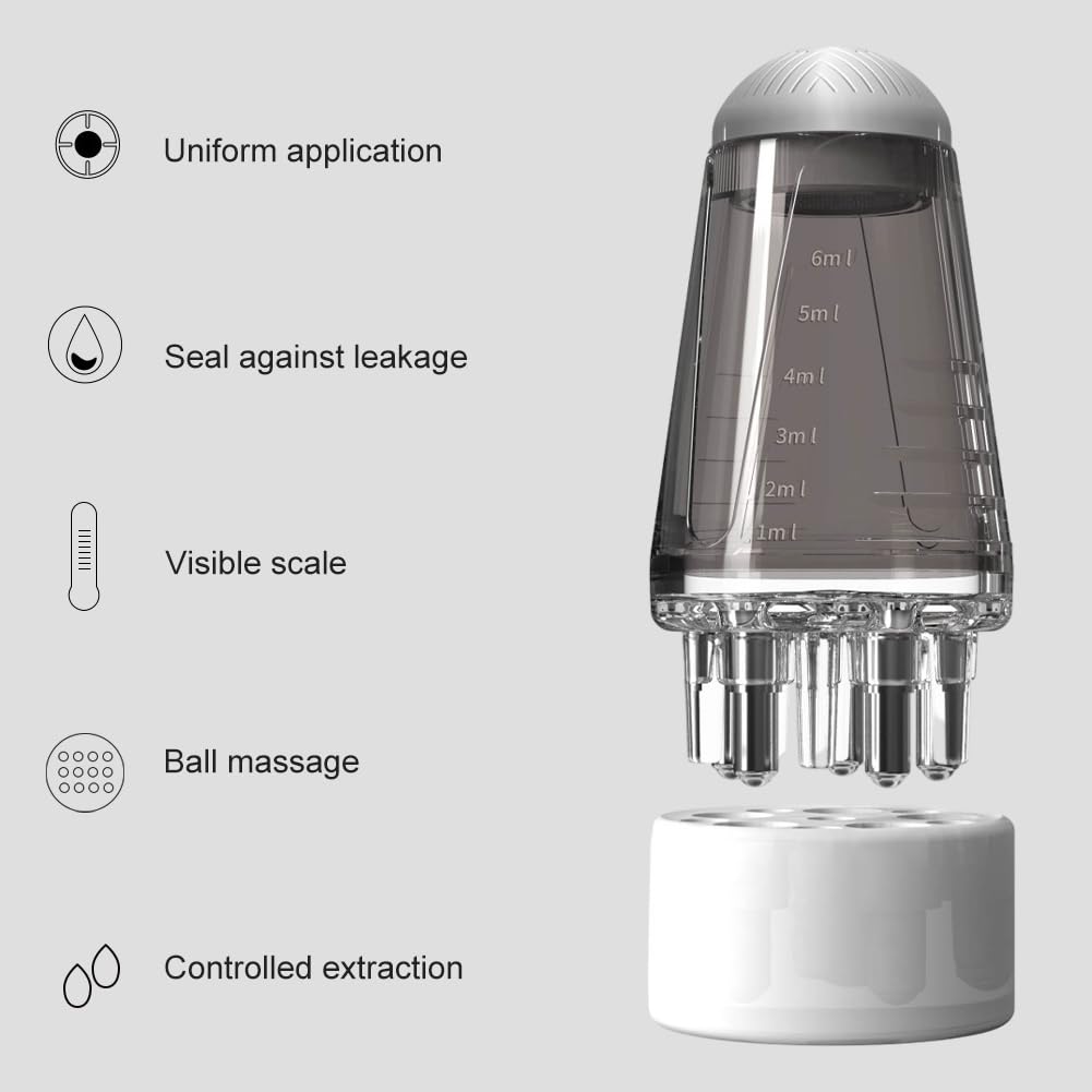 Scalp massager root comb bottle showing measurement scale