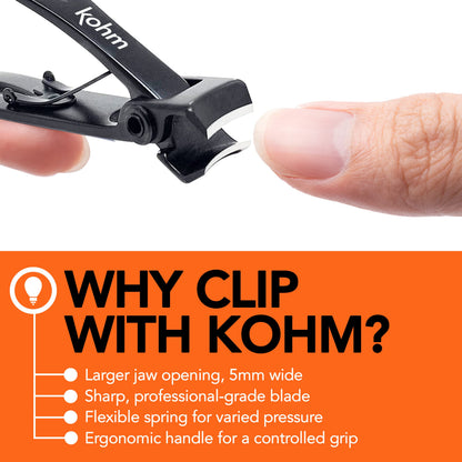 Kohm wide jaw clipper held in hand for scale