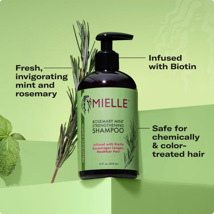 Close up of the pump and cap mechanism of Mielle Organics hair strengthening shampoo