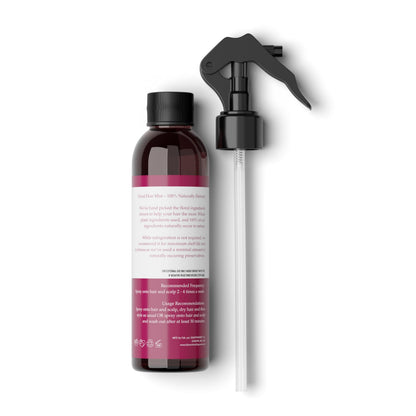 Handcrafted small batch botanical hair mist showing rosemary and mint ingredients.