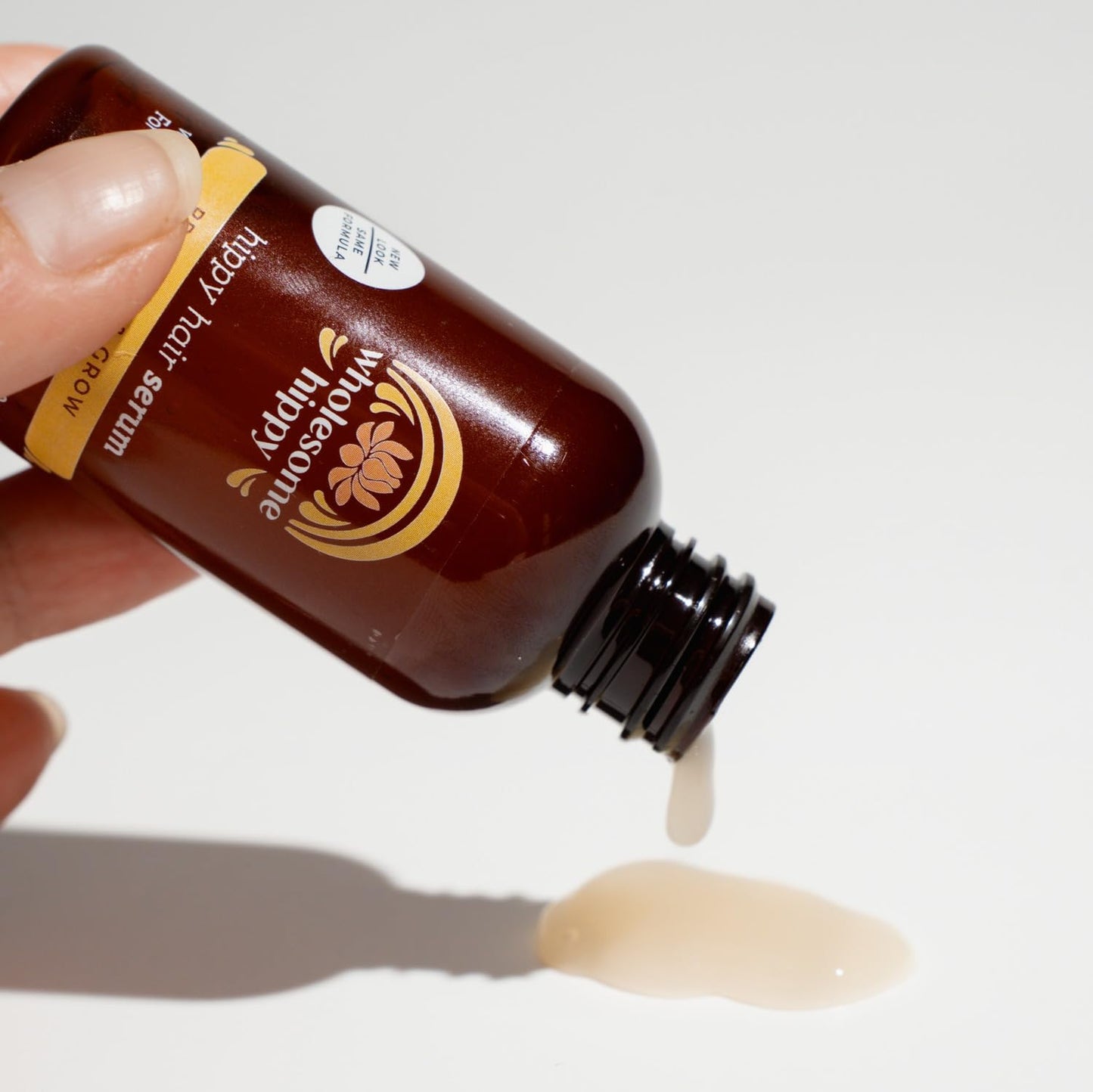 Wholesome Hippy hair serum for thinning hair care showing imported American beauty product packaging.